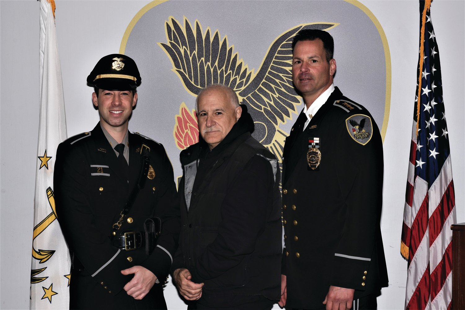 PROMOTED: Sgt. Michael Martufi is joined by Johnston Mayor Joseph Polisena and Chief Joseph Razza during his promotional ceremony held at police department headquarters.